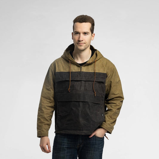 Man wearing the Bickford USA Anorak Sailcloth Jacket in tan and black waxed cotton, front view with hood down.