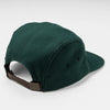 Back view of Bickford 5-Panel Wool Cap in green showing leather adjustable strap
