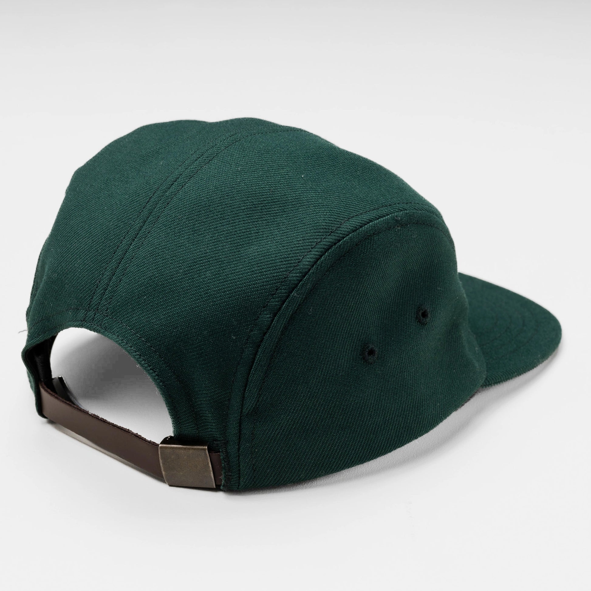 Back view of Bickford 5-Panel Wool Cap in green showing leather adjustable strap