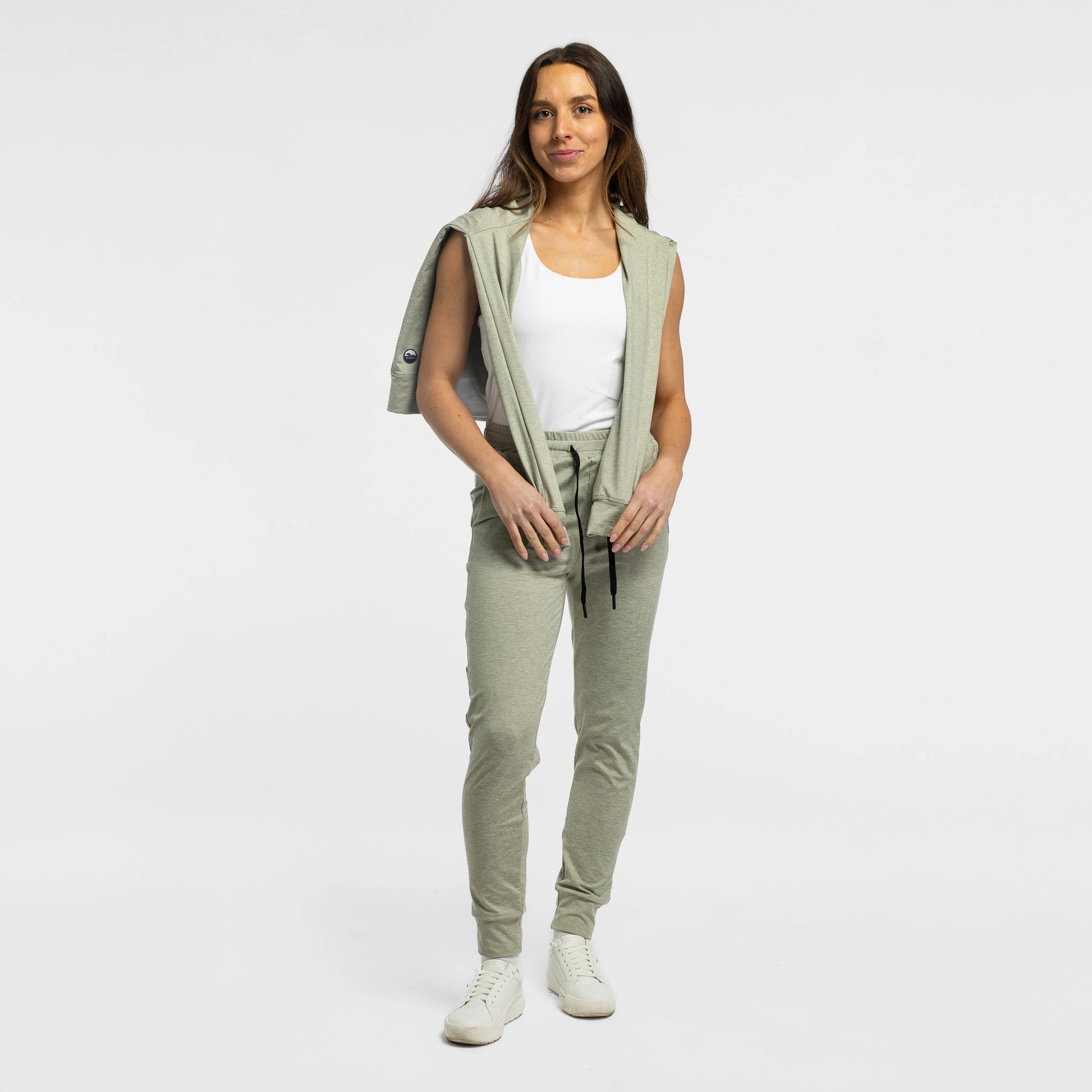 Woman styling Bickford Cloud Gray Athletic Joggers with white tank and draped hoodie