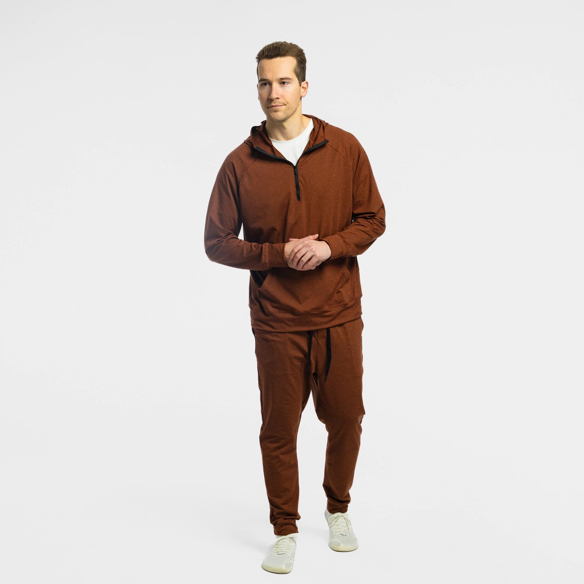 Man wearing Bickford Athletic Joggers and matching hoodie in Rust, full body view