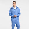 Man wearing Bickford Athletic Quarter Zip Hoodie and matching joggers in Blue Bird, full body view