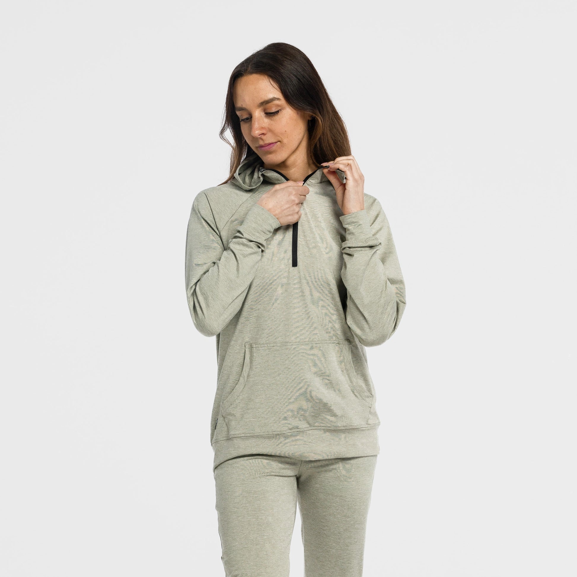 Woman wearing Bickford Athletic Quarter Zip Hoodie and matching joggers in Cloud Gray, full body view