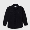 Bickford USA button-down fleece overshirt in black, flat lay front view, featuring a spread collar, dual chest pockets with button flaps, a full front button placket with matte black buttons, and a curved hem, against a light gray background.