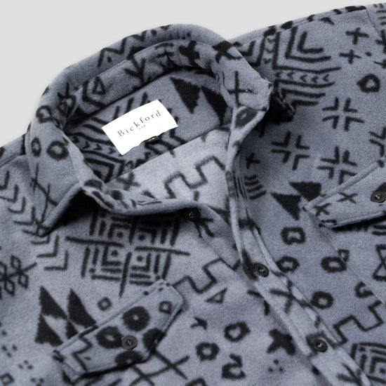 Close-up detail of the open collar and upper chest of the Bickford USA Boulder colorway button-down fleece overshirt, showing the spread collar, Bickford USA label inside the neck, dark buttons, and chest pocket flap.