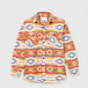 Bickford USA button-down fleece overshirt in the Heritage Trail colorway — a Southwestern-inspired pattern in warm tones of tan, rust, orange, gold, cream, and slate blue — flat lay front view, featuring a spread collar, dual chest pockets with button flaps, a full button placket with dark buttons, and a curved hem, against a light gray background.