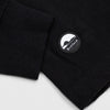 Detail of cuff and Bickford logo patch on Black Everyday Long Sleeve Tee