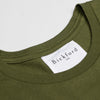 Close-up of Bickford USA woven neck label on Army Green Everyday Tee