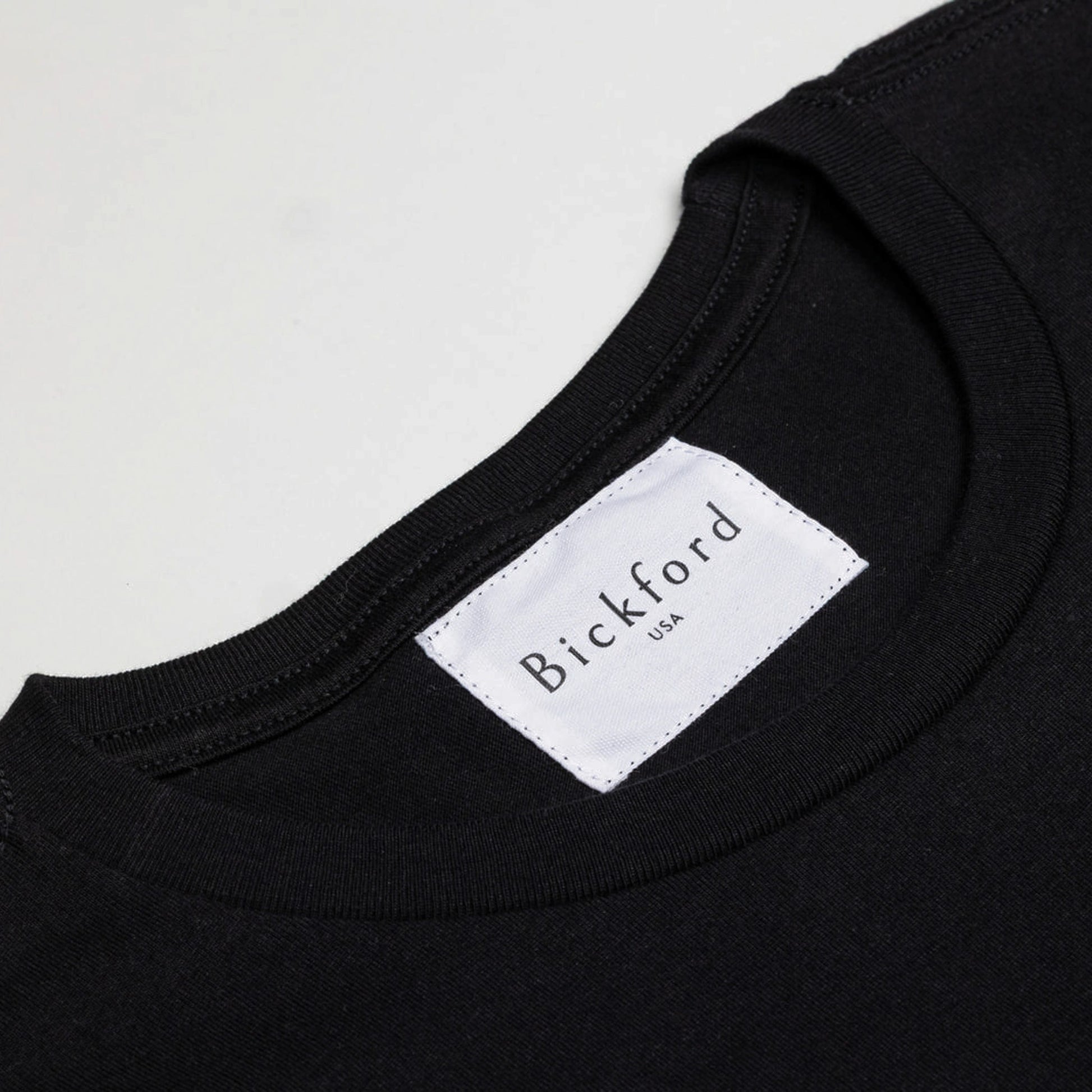 Close-up of Bickford USA woven neck label on Black Everyday Tee