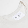Close-up of Bickford USA woven neck label on Natural White Everyday Tee