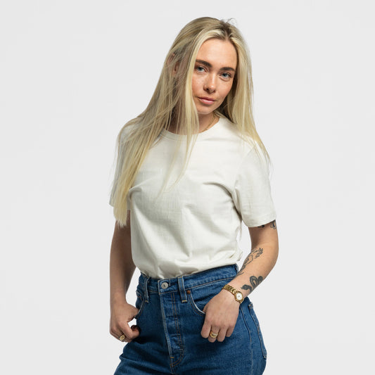 Woman wearing Bickford Everyday Tee in Natural White with jeans