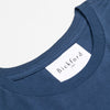 Close-up of Bickford USA woven neck label on Navy Everyday Tee