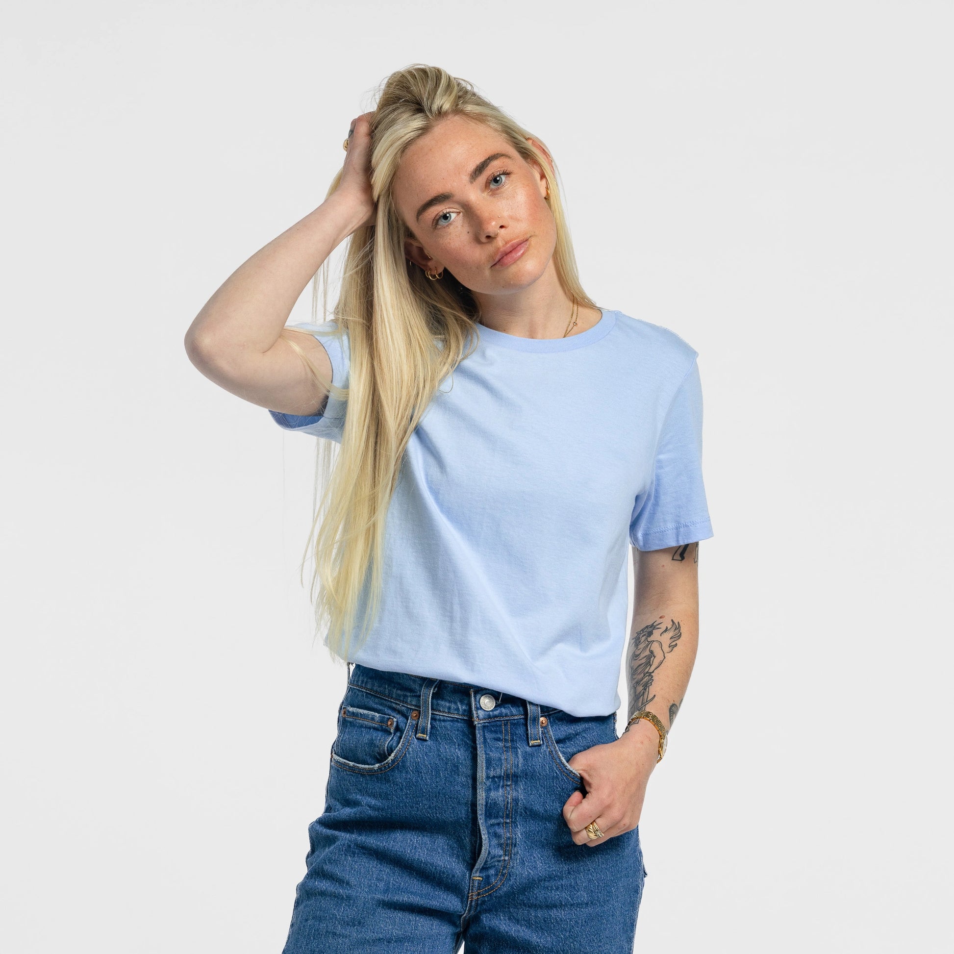 Woman wearing Bickford Everyday Tee in Sky Blue with jeans