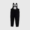 Bickford USA fleece overall bib in black, front view, featuring adjustable shoulder straps with Fidlock buckles and a gray chest pocket with zipper, against a light gray background.