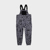 Bickford USA fleece overall bib in the Boulder colorway — a gray base with an allover black geometric and tribal print — front view with black chest pocket and Fidlock buckles, against a light gray background.