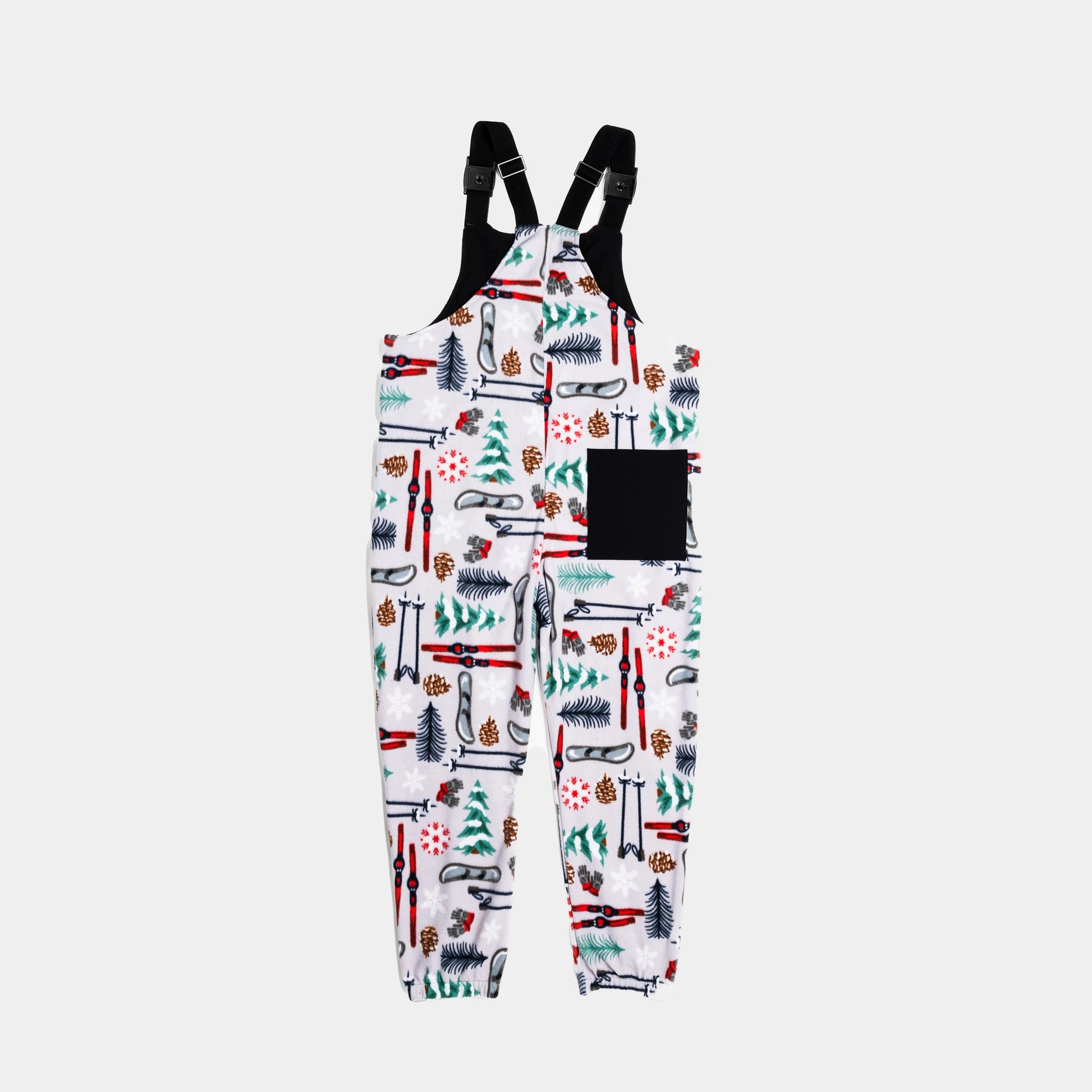 Bickford USA fleece overall bib in the Sugarbush colorway, back view, showing the black square back pocket, elastic ankle cuffs, and the full winter ski resort print pattern, against a light gray background.