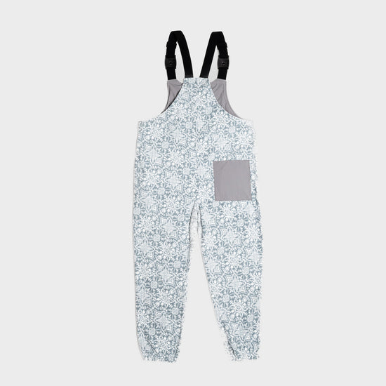 Bickford USA fleece overall bib in Snowflake colorway, back view, showing the gray square back pocket and elastic ankle cuffs, against a light gray background.