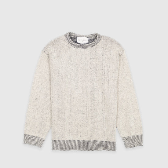 Bickford USA The 1926 Sweater in natural and grey, laid flat on a light gray background, showing the full front with a marled knit body and contrasting grey ribbed crew neck, cuffs, and hem.