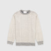 Bickford USA The 1926 Sweater in natural and grey, laid flat on a light gray background, showing the full front with a marled knit body and contrasting grey ribbed crew neck, cuffs, and hem.