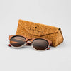 Bickford USA Timberline Half-Frame Sunglasses in walnut wood beside the branded cork carrying case.