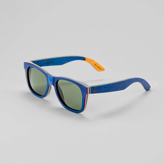 Bickford USA Timberline Full-Frame Sunglasses in deep blue wood, angled side view showing the layered wood temples and engraved Bickford logo.