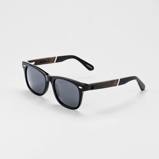 Bickford USA Timberline Full-Frame Sunglasses in midnight black, angled side view showing the wood temple inlay and engraved Bickford logo.