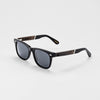 Bickford USA Timberline Full-Frame Sunglasses in midnight black, angled side view showing the wood temple inlay and engraved Bickford logo.