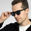 Man wearing the Bickford USA Timberline Full-Frame Sunglasses in midnight black with smoke lenses.