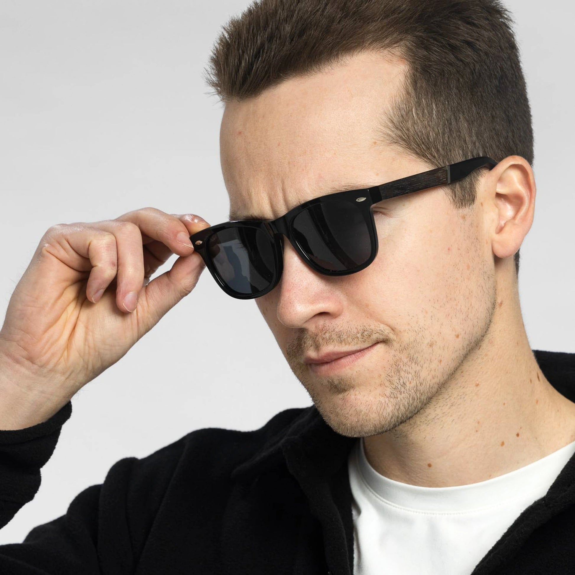Man wearing the Bickford USA Timberline Full-Frame Sunglasses in midnight black with smoke lenses.