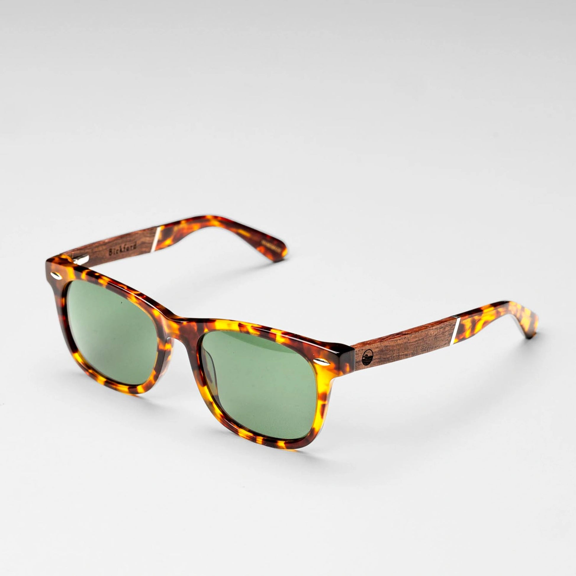 Bickford USA Timberline Full-Frame Sunglasses in tortoise, angled side view showing the wood temple inlay and engraved Bickford logo.
