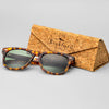 Bickford USA Timberline Full-Frame Sunglasses in tortoise beside the branded cork carrying case.