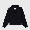 Bickford USA Women's Cropped Quarter-Zip fleece pullover in solid black, laid flat on a light gray background, showing the full front with a wide fold-over collar, brass quarter-zip closure, front kangaroo pocket, and ribbed hem and cuffs.