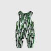 Bickford USA Youth fleece overalls in the Eastern Pine colorway, laid flat on a light gray background, featuring an all-over print of layered pine trees in shades of green, black, and cream with a moon motif, with brass snap shoulder straps, a chest bib pocket with circular Bickford logo patch, two side pockets, and elasticized ankle cuffs.