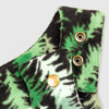 Close-up detail of the Eastern Pine Youth Overalls showing the adjustable shoulder strap with brass snap closures against the green and black pine tree print.