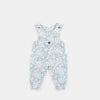 Bickford USA Youth fleece overalls in the Snowflake colorway, laid flat on a light gray background, featuring an all-over ornate snowflake and medallion print in grey and white, with brass snap shoulder straps, a chest bib pocket with circular Bickford logo patch, two side pockets, and elasticized ankle cuffs.