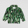 Bickford USA Youth Quarter-Zip fleece pullover in the Eastern Pine colorway, laid flat on a light gray background, featuring an all-over print of layered pine trees in shades of green, black, and cream with a moon motif, funnel collar, quarter-zip closure, and front kangaroo pocket.